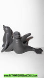Rudolph 2001 CHRISTMAS SEALS island of toys playing christmas mantis