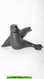 Rudolph 2001 CHRISTMAS SEALS island of toys playing christmas mantis